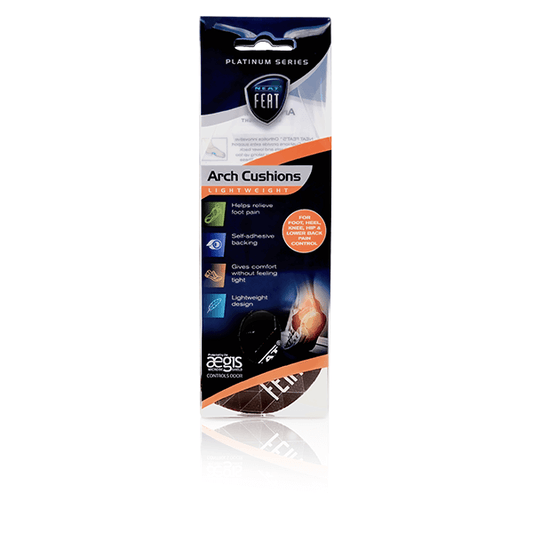 Front view of the Neat Feat Platinum Series Arch Cushions packaging. The mostly clear packaging with black and orange accents gives a glimpse of the arch cushions inside, slightly visible through the transparent section.