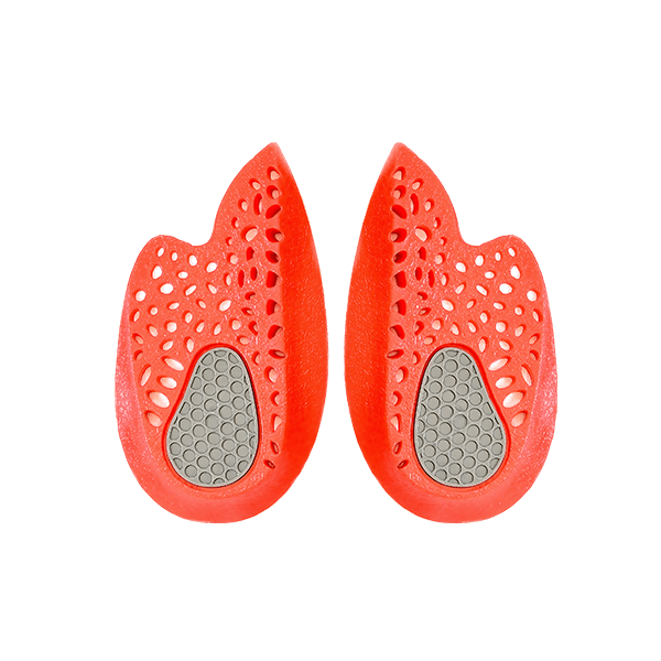 The sole of the Platinum Series Spur Pad for Pressure Relief and Inflammation, featuring a textured design with a grey centre and red outer edges. This design aims to provide enhanced comfort and pressure relief.